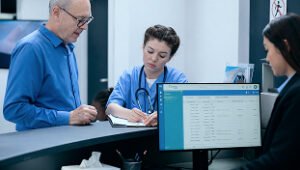 Healthcare team analyzing Episode-Based Payment Models with CMS data, BPCI-A and CJR program insights